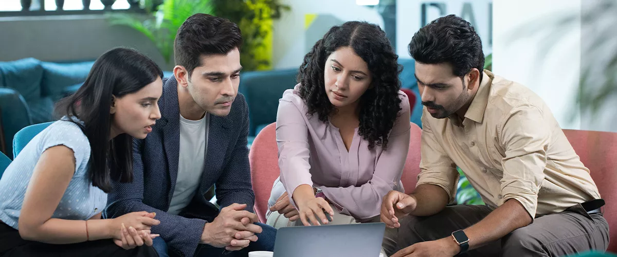 Team hands stacked in unity